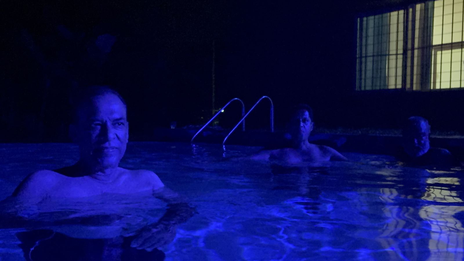 Night pool with blue lighting