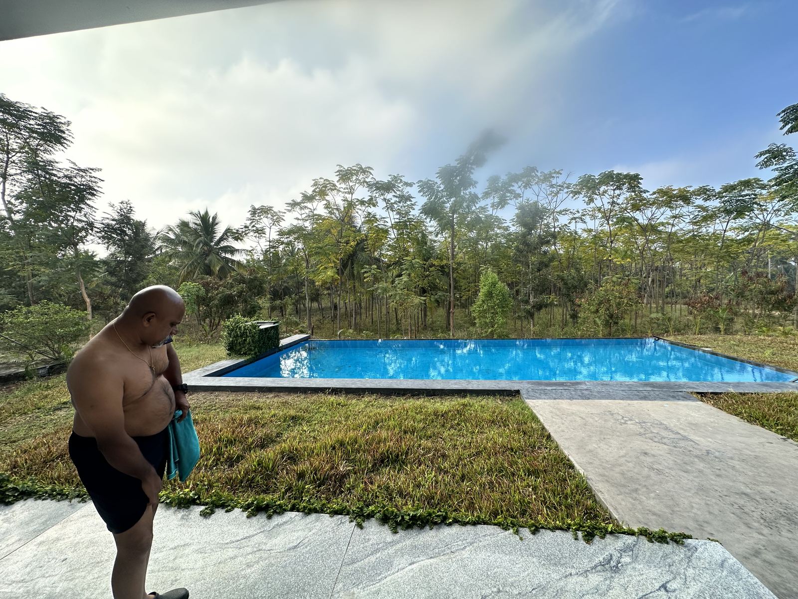Infinity pool with farm view
